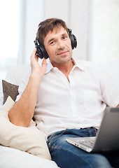 Image showing man with headphones listening to music