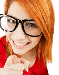 Image showing woman in glasses pointing finger