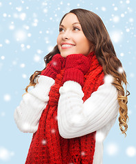 Image showing woman in sweater, scarf and mittens