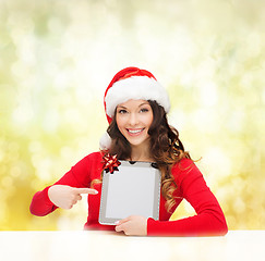 Image showing woman in santa helper hat with tablet pc