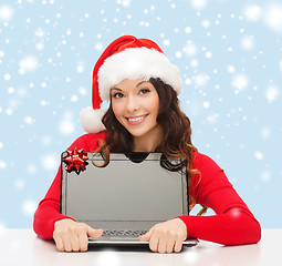 Image showing woman in santa helper hat with laptop computer