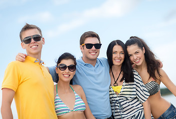 Image showing group of friends having fun on the beach