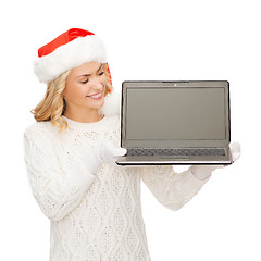 Image showing woman in santa helper hat with laptop computer