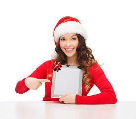 Image showing woman in santa helper hat with tablet pc