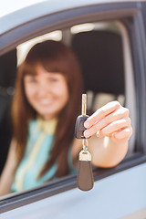 Image showing happy woman holding car key