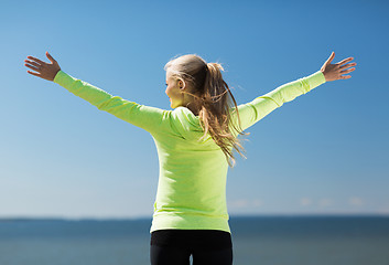 Image showing woman doing sports outdoors