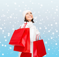 Image showing picture of happy woman with shopping bags