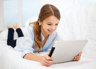 Image showing girl with tablet pc at home