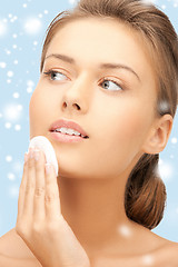 Image showing beautiful woman with cotton pad