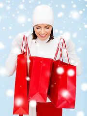 Image showing picture of happy woman with shopping bags