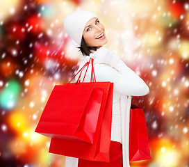 Image showing picture of happy woman with shopping bags