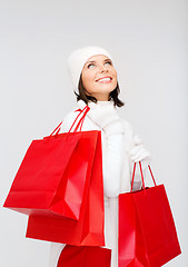 Image showing picture of happy woman with shopping bags