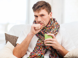 Image showing ill man with flu at home