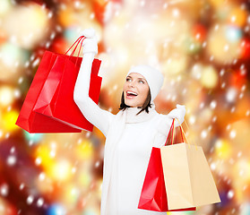 Image showing picture of happy woman with shopping bags