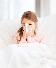 Image showing ill girl with paper tissue