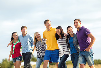 Image showing group of friends having fun on the beach