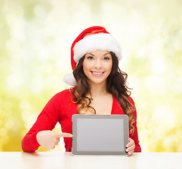 Image showing woman in santa helper hat with tablet pc