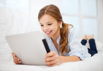 Image showing girl with tablet pc at home