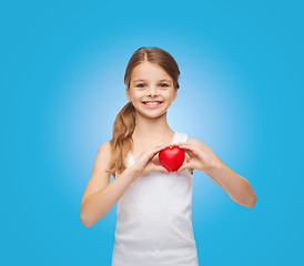 Image showing girl in blank white shirt with small red heart