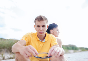 Image showing stressed couple outside