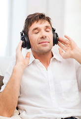 Image showing man with headphones listening to music