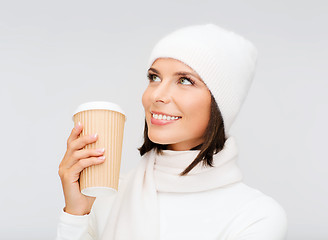 Image showing woman in hat with takeaway tea or coffee cup