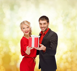 Image showing smiling woman and man with gift box