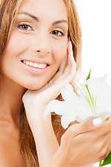 Image showing lovely woman with white lily flower
