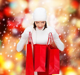 Image showing picture of happy woman with shopping bags