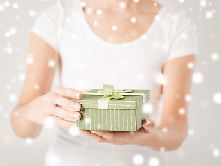 Image showing woman hands with gift box