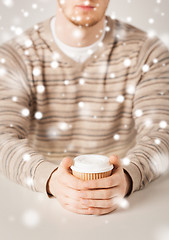 Image showing man hand holding take away coffee cup