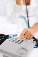 Image showing businesswoman with phone calling