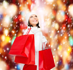 Image showing picture of happy woman with shopping bags