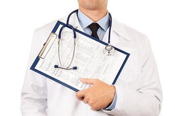 Image showing Doctor holding clipboard