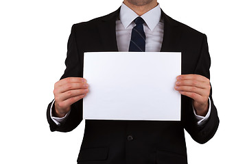 Image showing businessman holding white placard