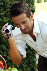 Image showing man with digital camera