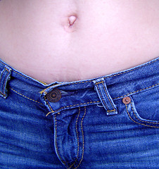 Image showing Belly Button and Jeans