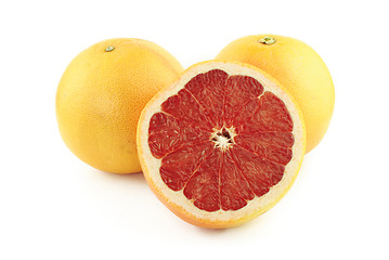 Image showing Two grapefruits and half