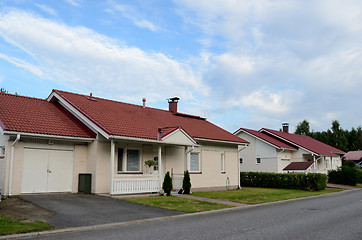 Image showing several low-rise houses near the forest