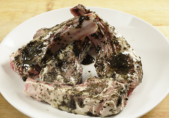 Image showing Lamb chops coated in marinade