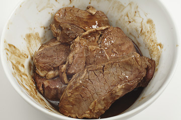 Image showing Marinading beef
