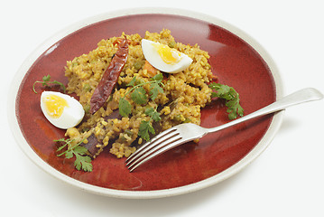 Image showing Kichuri plate and fork with egg