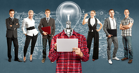 Image showing Business Team With Lamp Head