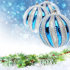 Image showing Pine branch and blue Christmas balls.