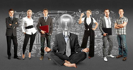 Image showing Business Team With Lamp Head