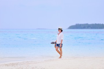 Image showing beautiful gril on beach have fun