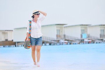 Image showing beautiful gril on beach have fun