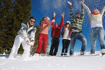 Image showing friends have fun at winter on fresh snow