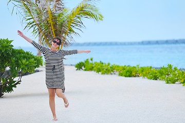 Image showing beautiful gril on beach have fun