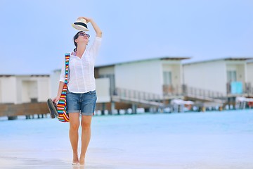 Image showing beautiful gril on beach have fun